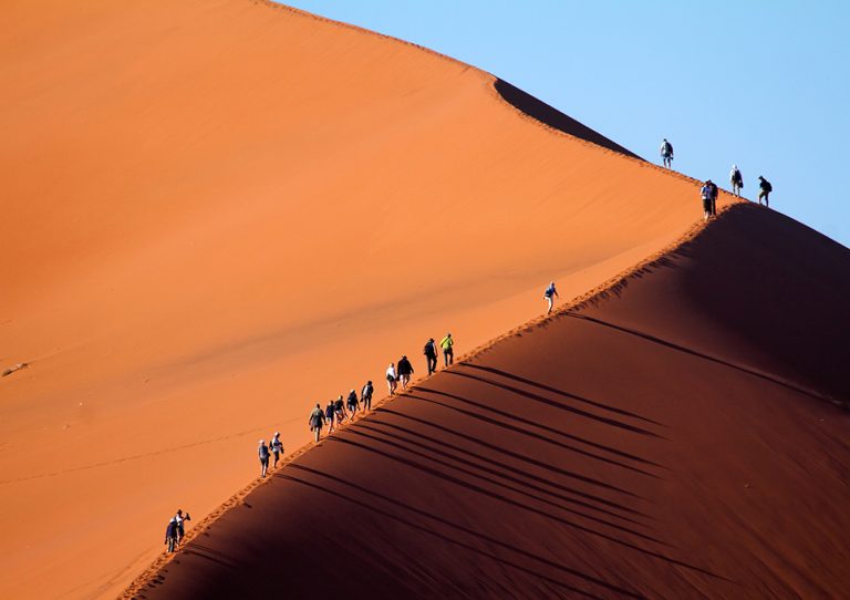 Climbing Great dune in Sossusvlei, Namibia