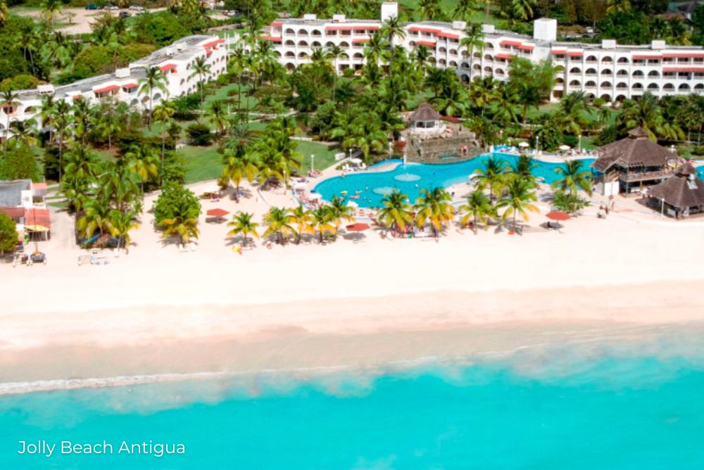 Lizzis Luxury Edit new luxury hotels Jolly Beach Antigua aerial from ocean outdoor seating 16Nov22