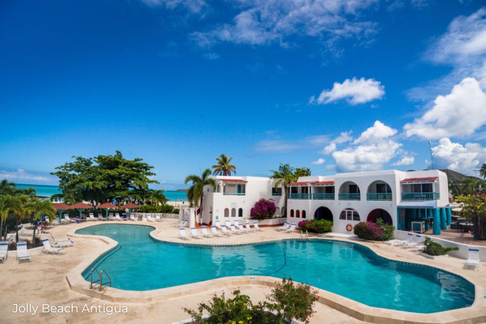Lizzis Luxury Edit new luxury hotels Jolly Beach Antigua pool from ocean outdoor seating 16Nov22