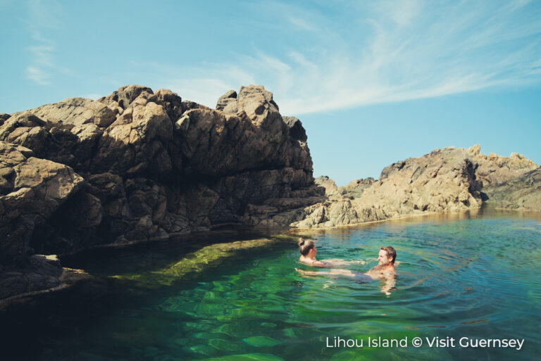 Lihou Island couple swimming cc Visit Guernsey