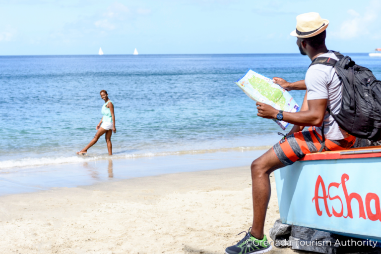 Free to wonder couple on beach Sustainable Grenada 18Jul23