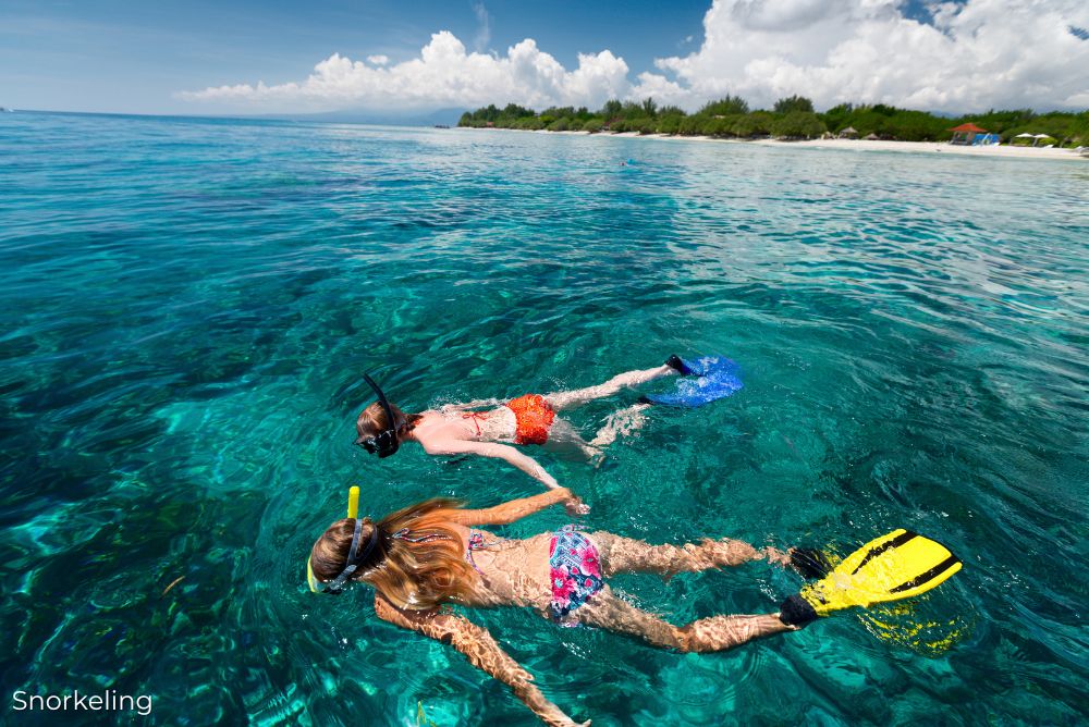 The best holidays to keep active man sea snorkelling 17Jan24